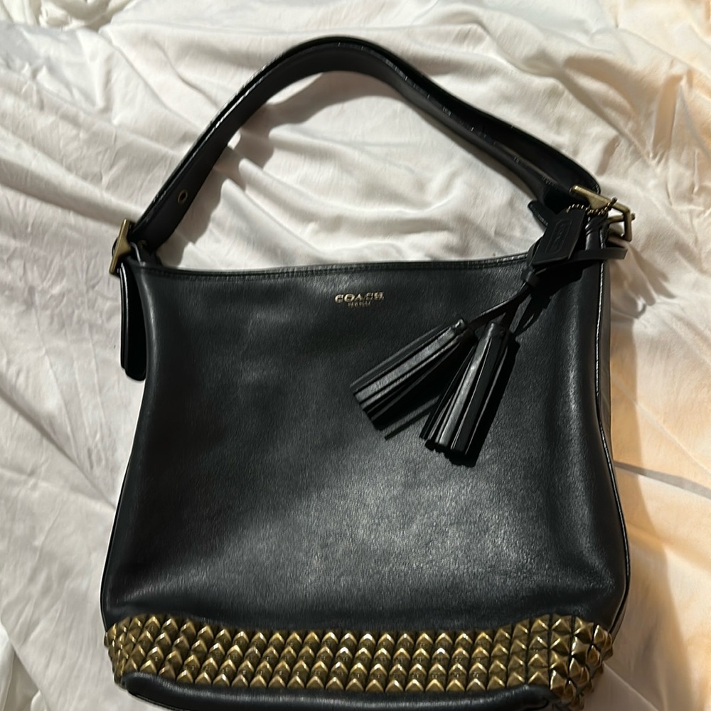 Studded Coach bucket purse-gently used